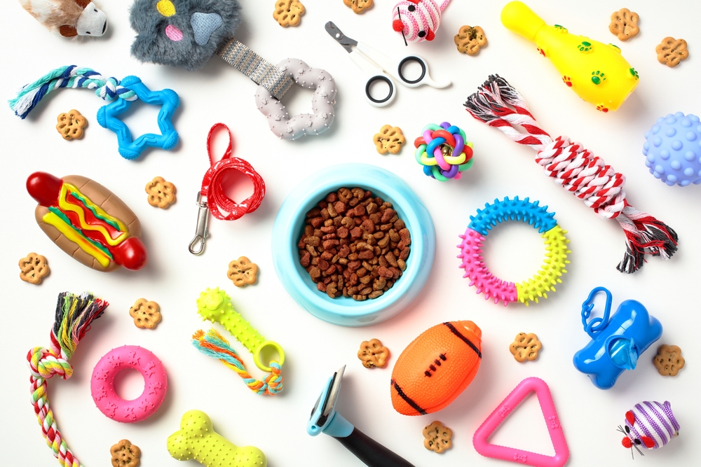 Bowl,With,Dry,Food,And,Many,Different,Pet,Toys,On